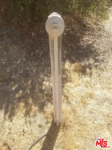 an aerial view of a highlighted house