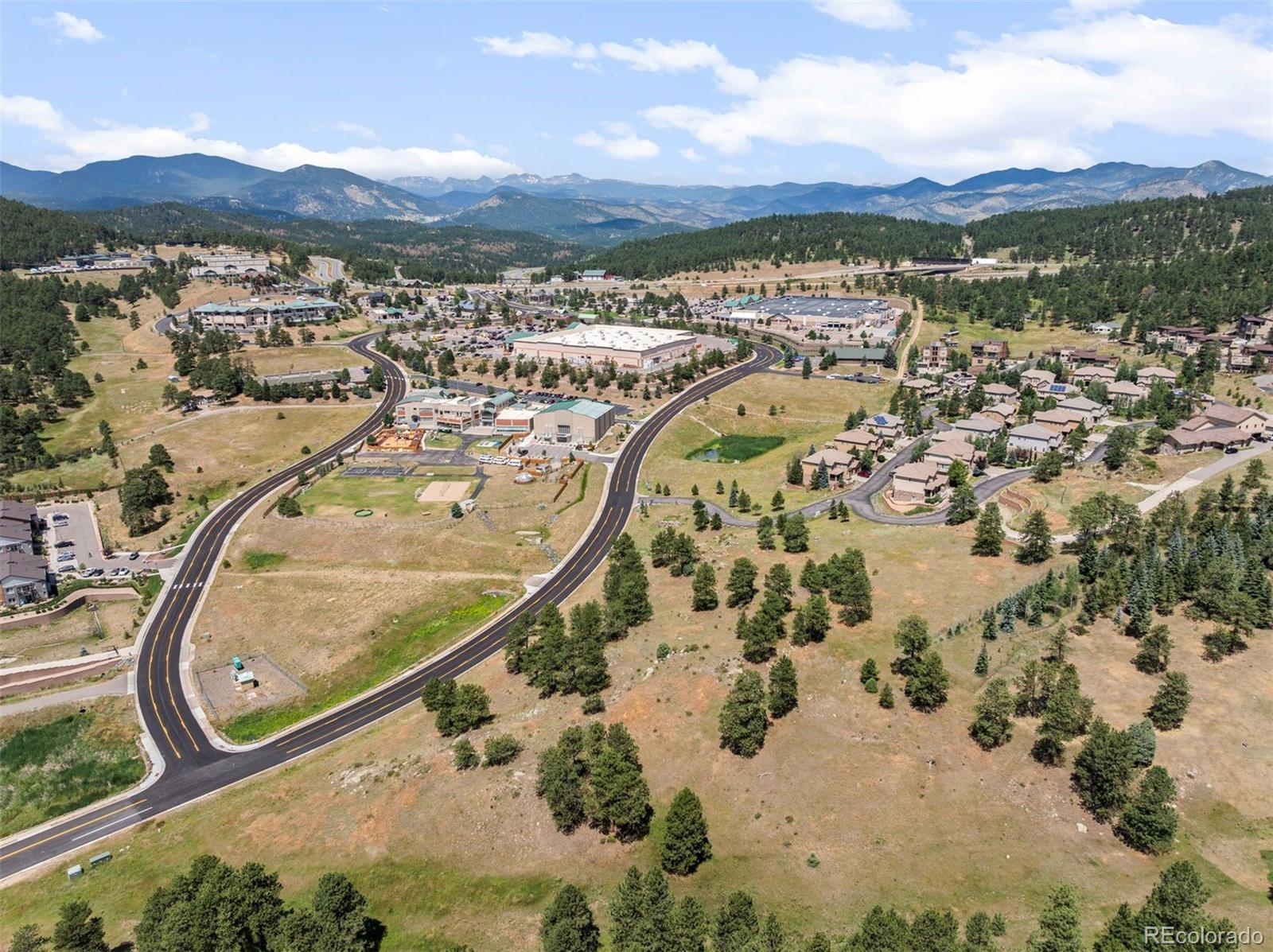 1162 Swede Gulch Road Evergreen, CO 80439 - Photo 18 of 27 an aerial view of swimming pool and mountain view