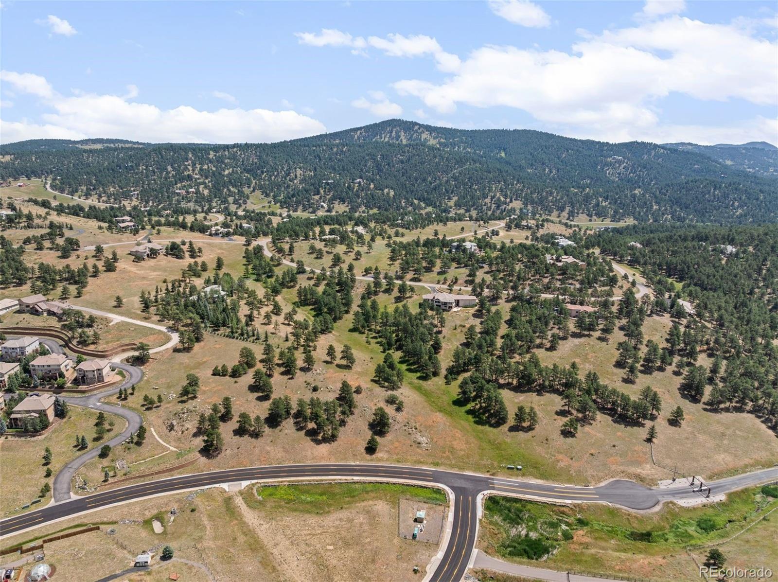 1162 Swede Gulch Road Evergreen, CO 80439 - Photo 24 of 27 an aerial view of a residential houses with city view