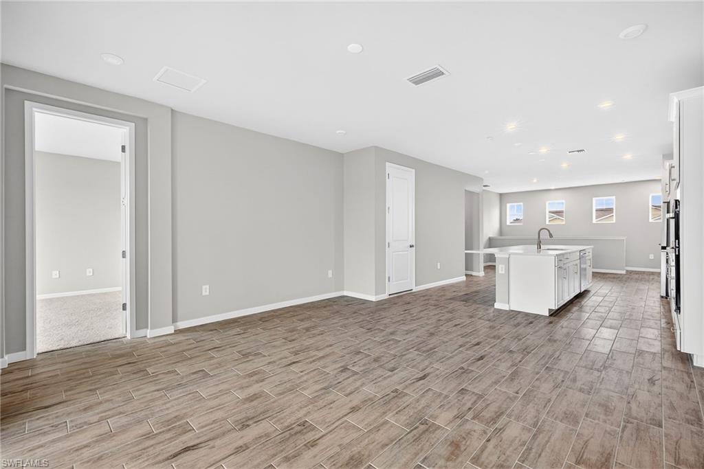 4596 Arboretum Circle, Unit 202 Naples, FL 34112 - Photo 10 of 24 Open living area