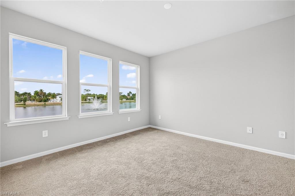 4596 Arboretum Circle, Unit 202 Naples, FL 34112 - Photo 12 of 24 Master Bedroom