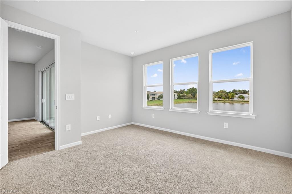 4596 Arboretum Circle, Unit 202 Naples, FL 34112 - Photo 13 of 24 Master Bedroom