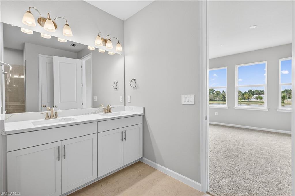 4596 Arboretum Circle, Unit 202 Naples, FL 34112 - Photo 15 of 24 Master bathroom