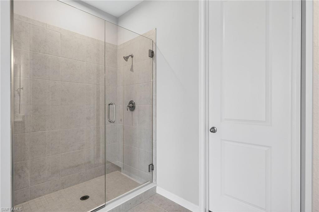 4596 Arboretum Circle, Unit 202 Naples, FL 34112 - Photo 17 of 24 Master Shower