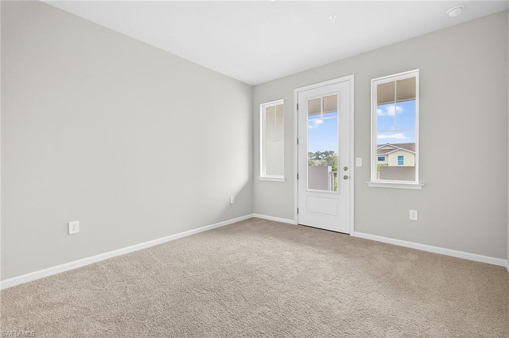 4596 Arboretum Circle, Unit 202 Naples, FL 34112 - Photo 18 of 24 Guest Bedroom