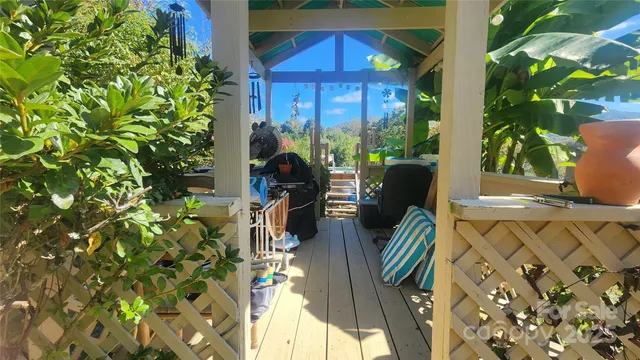 a view of balcony with patio