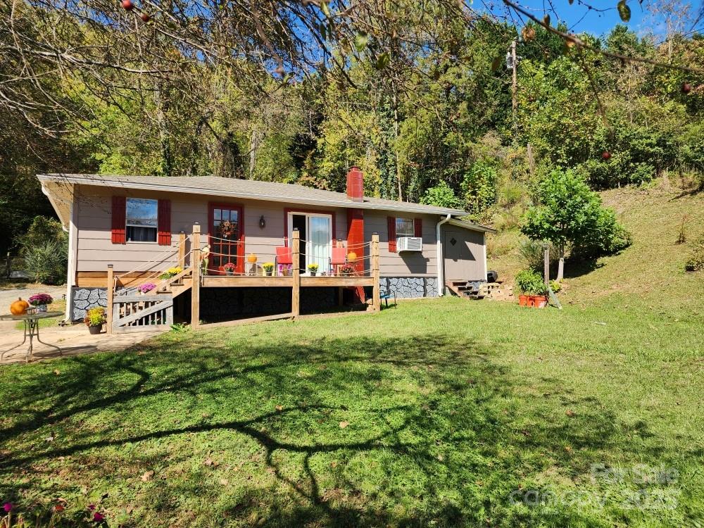 41 Gunches Dirt Road Candler, NC 28715 - Photo 4 of 33 front view of a house with a big yard