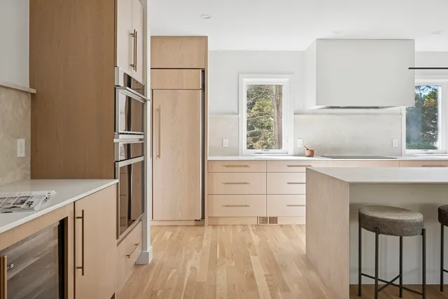 a kitchen with a sink and a window