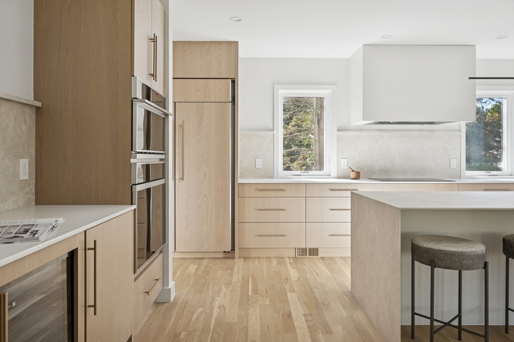873 Chestnut Street Newton, MA 02468 - Photo 11 of 22 a kitchen with a refrigerator sink and cabinets