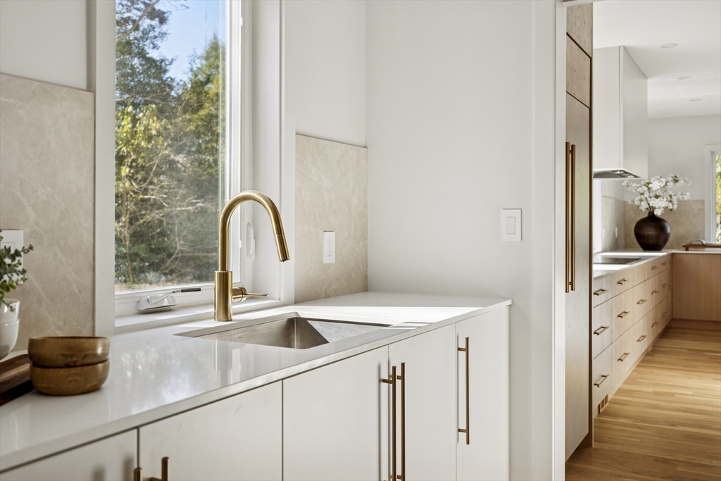873 Chestnut Street Newton, MA 02468 - Photo 12 of 22 a kitchen with a sink and a window