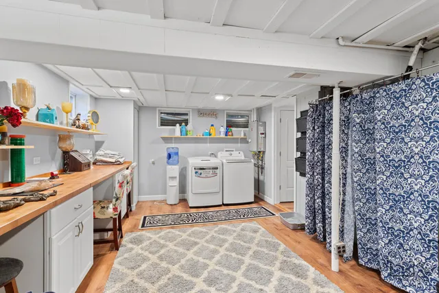 a kitchen with a refrigerator and a stove