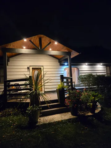 a view of a yard in front of the house