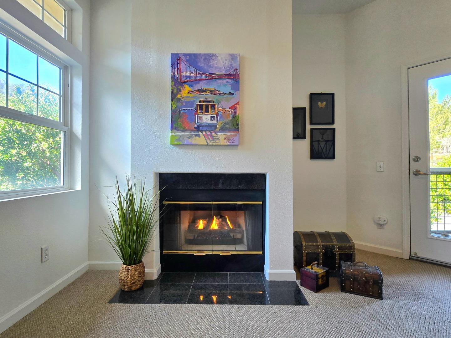 625 Callippe Court Brisbane, CA 94005 - Photo 1 of 27 a living room with furniture and a fireplace