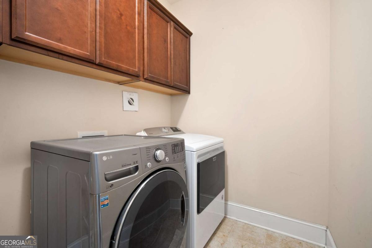 106 Danbury Court Pooler, GA 31322 - Photo 20 of 33 a utility room with dryer and washer