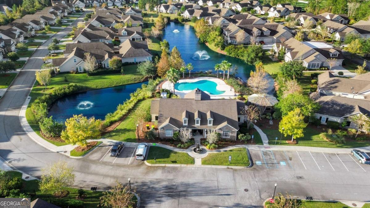 106 Danbury Court Pooler, GA 31322 - Photo 27 of 33 an aerial view of a house with a garden and swimming pool