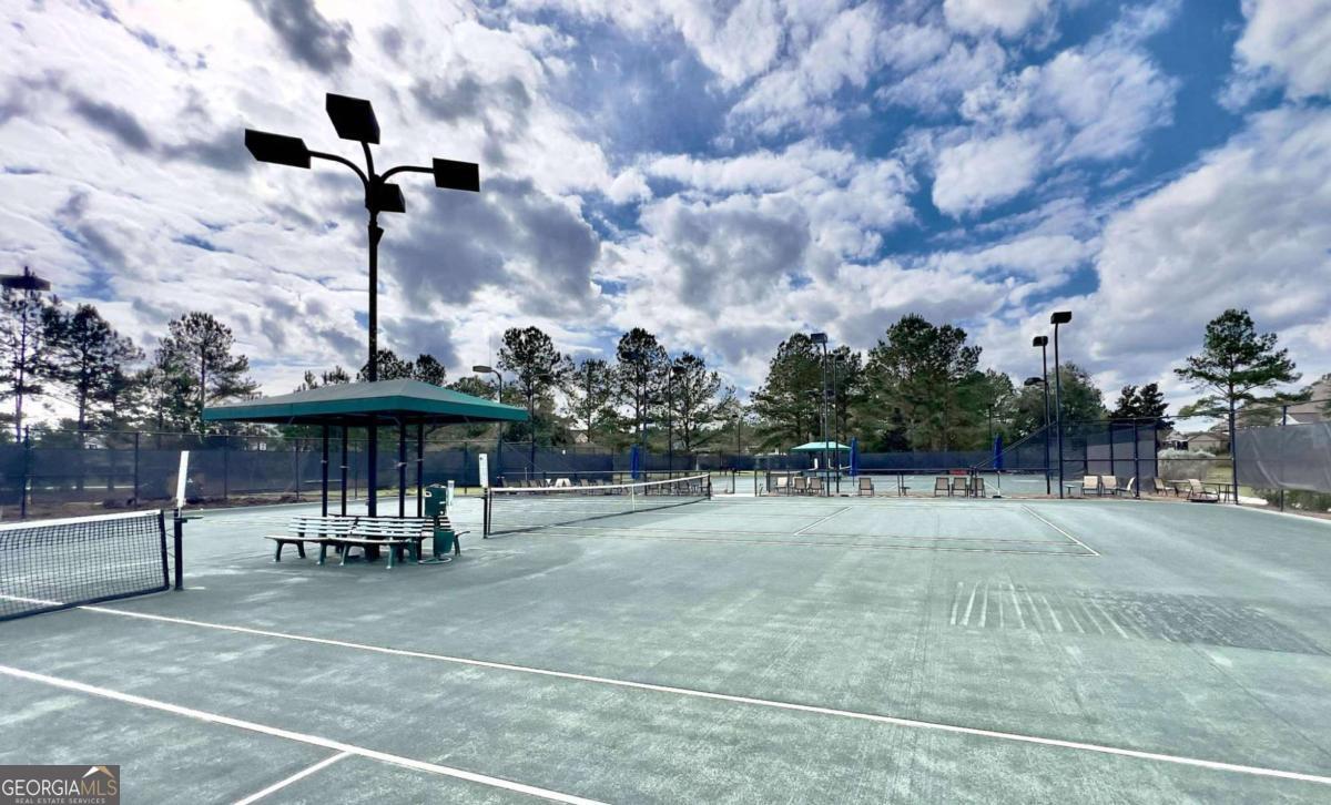 106 Danbury Court Pooler, GA 31322 - Photo 29 of 33 a view of a backyard with sitting area