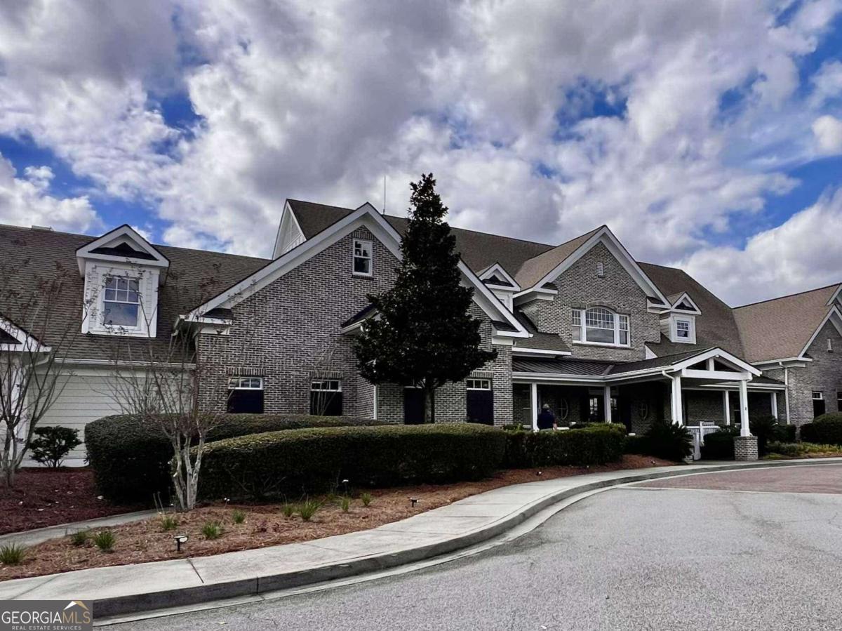 106 Danbury Court Pooler, GA 31322 - Photo 33 of 33 a front view of a house with a garden