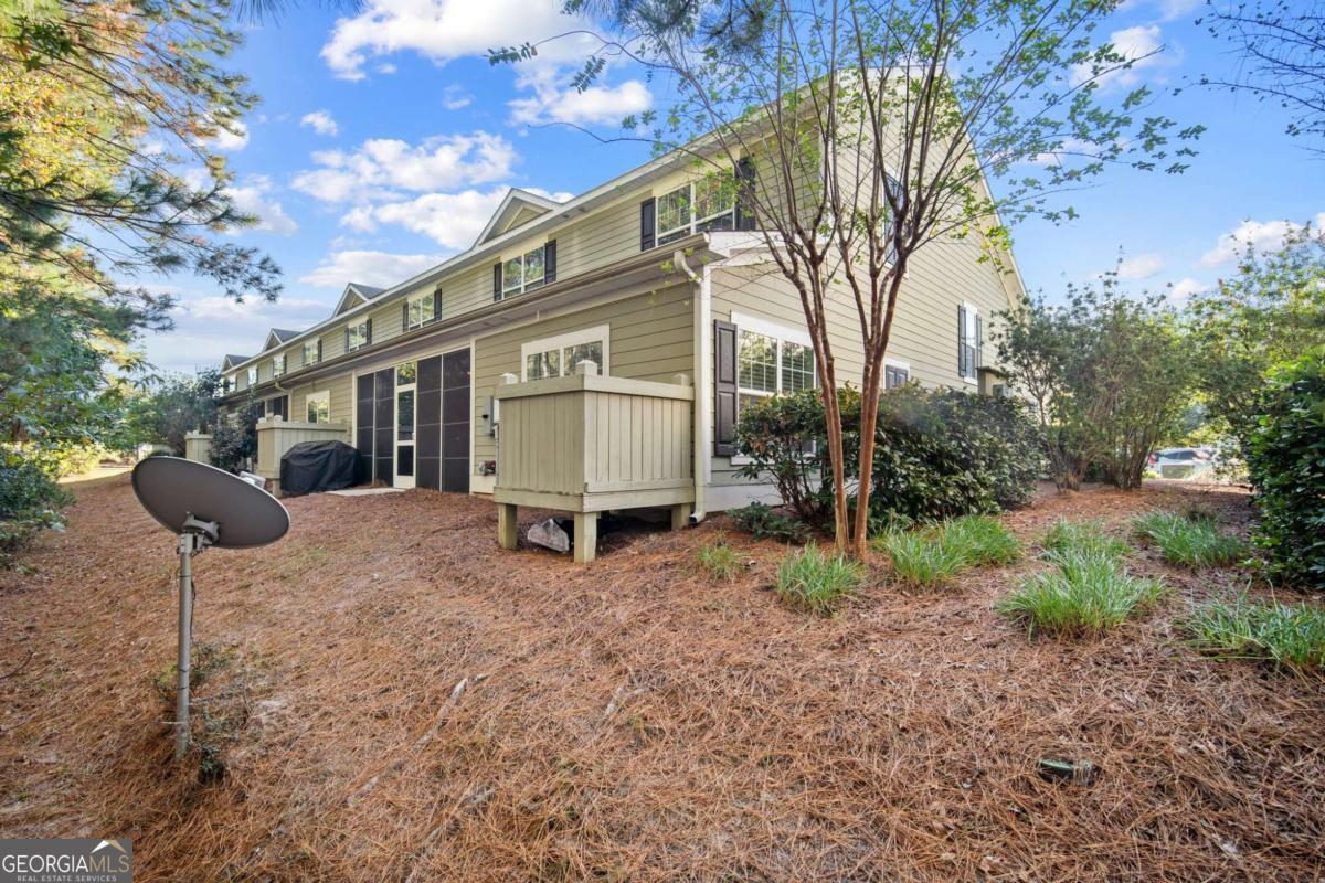 106 Danbury Court Pooler, GA 31322 - Photo 7 of 33 a view of a house with a yard