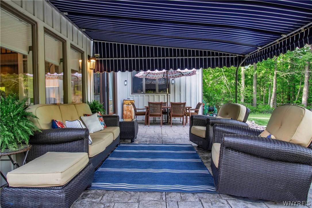 5555 Kraus Road Clarence, NY 14031 - Photo 38 of 50 Patio w/ Kohler Awning
