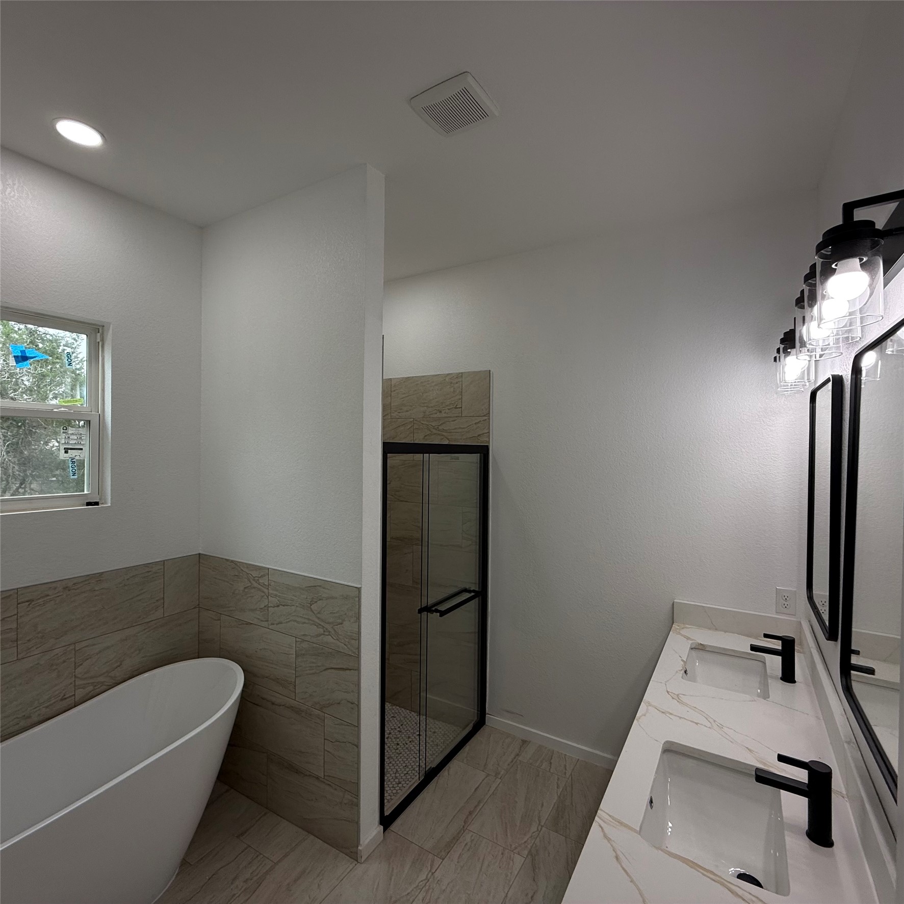 118 Crazy Cross Road Wimberley, TX 78676 - Photo 11 of 18 a bathroom with a tub sink and mirror