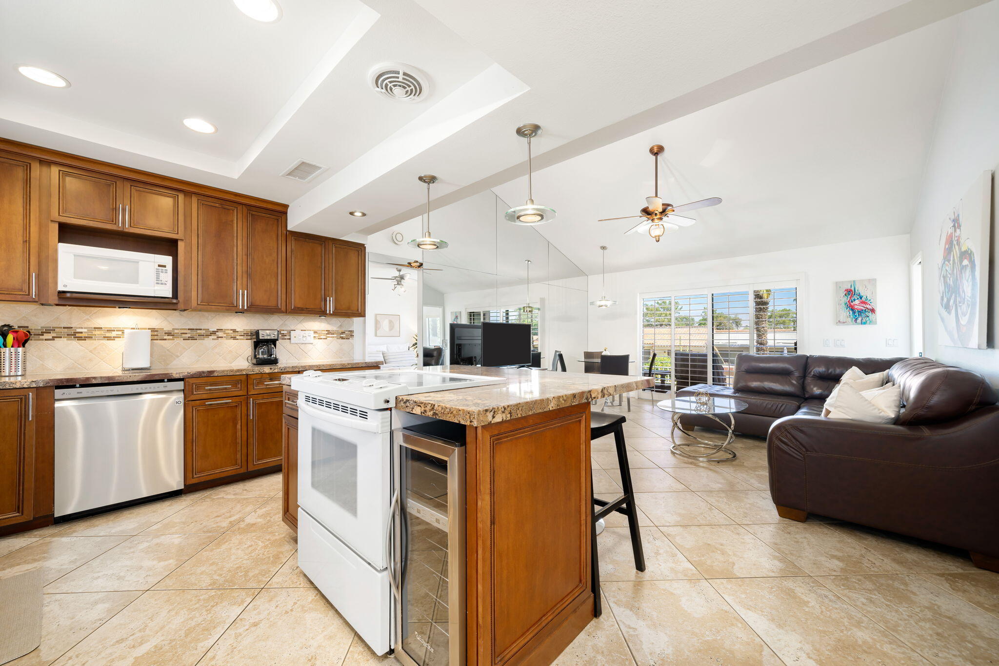 40960 La Costa Circle West Palm Desert, CA 92211 - Photo 14 of 45 a kitchen with stove top oven and cabinets