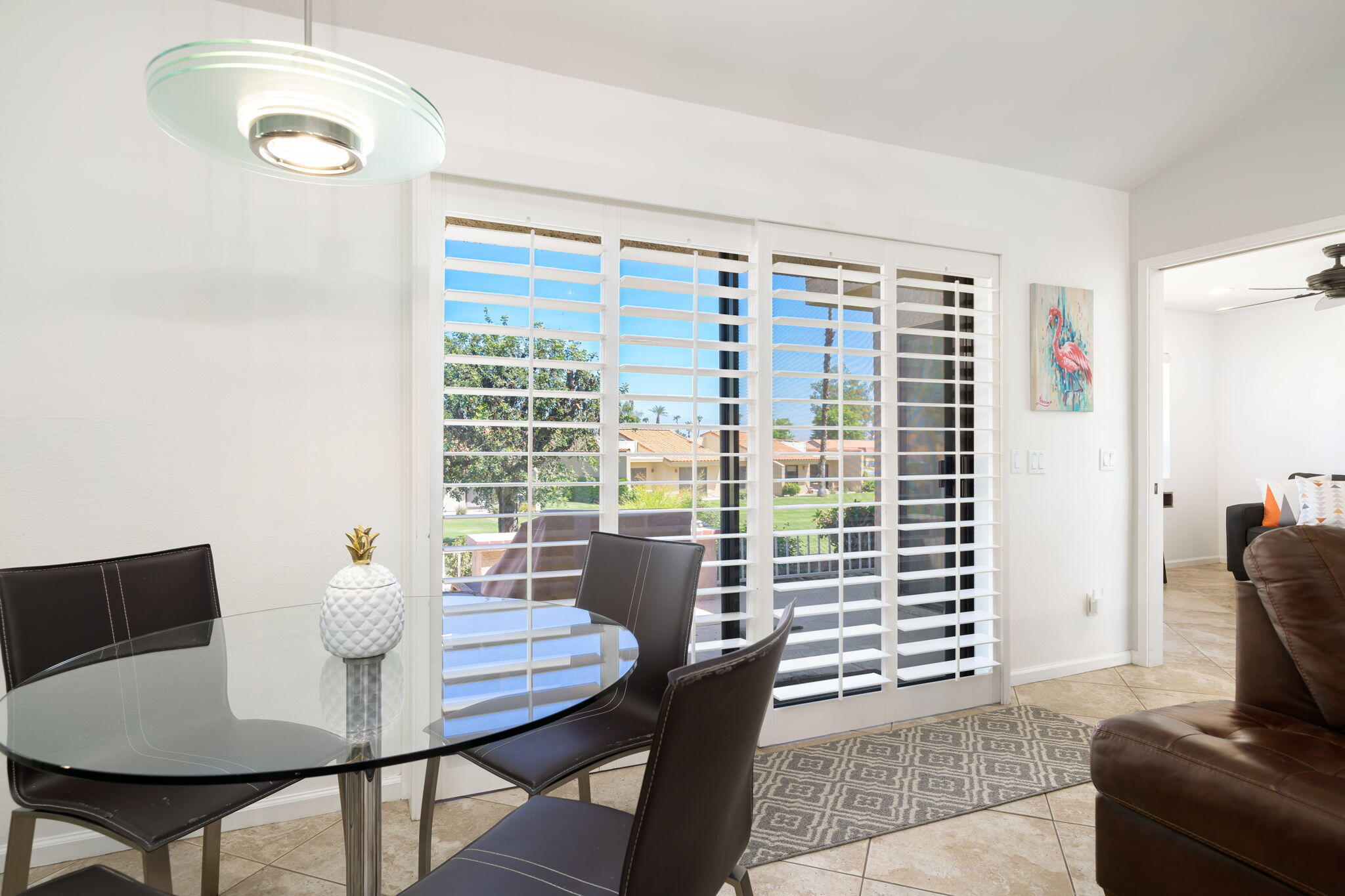 40960 La Costa Circle West Palm Desert, CA 92211 - Photo 19 of 45 a view of a dining room with furniture and a window