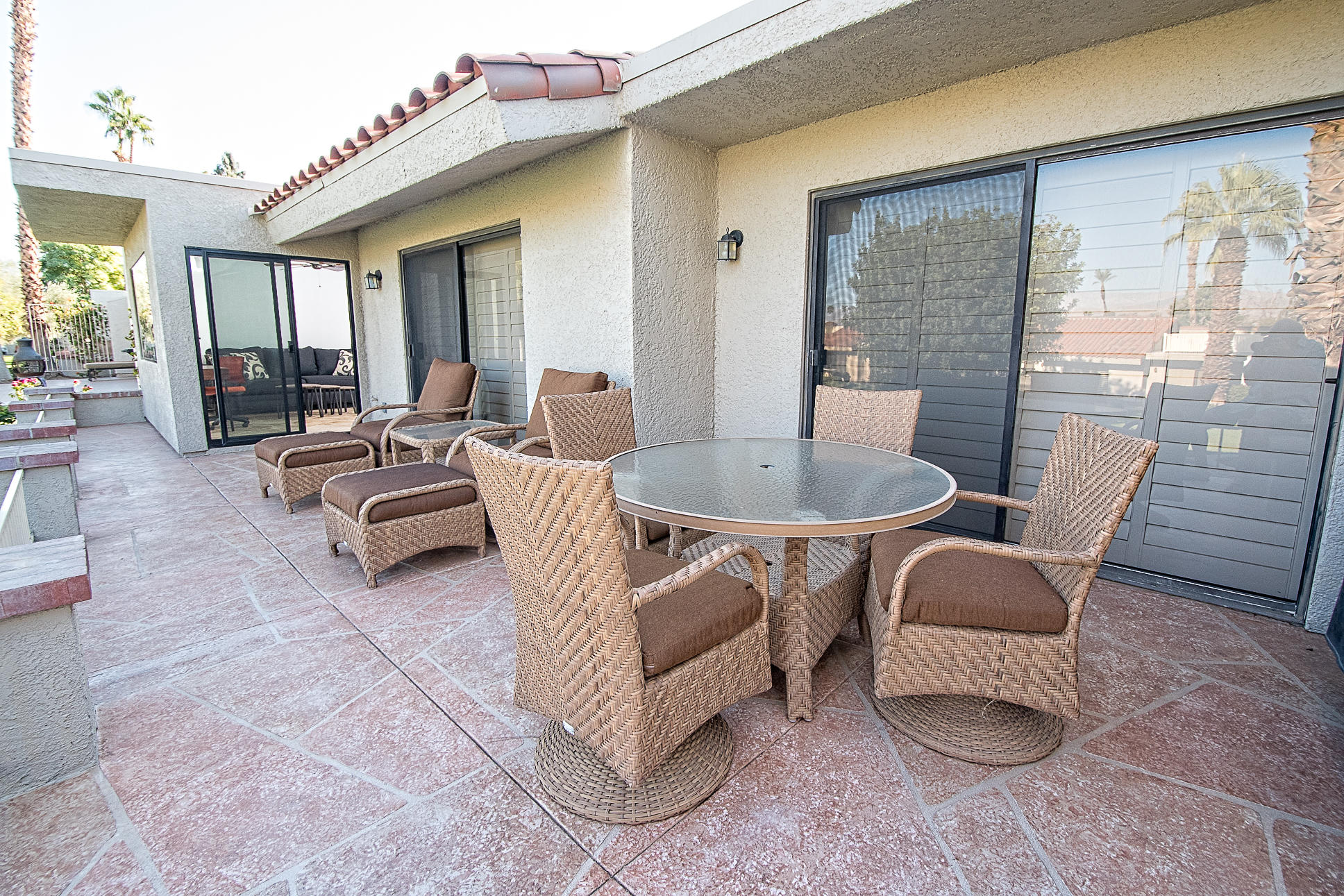 40960 La Costa Circle West Palm Desert, CA 92211 - Photo 38 of 45 a dining room with furniture and wooden floor