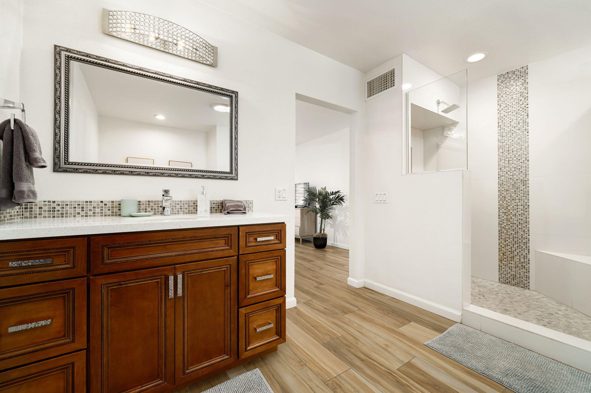 40960 La Costa Circle West Palm Desert, CA 92211 - Photo 10 of 45 a bathroom with a sink vanity granite and a mirror