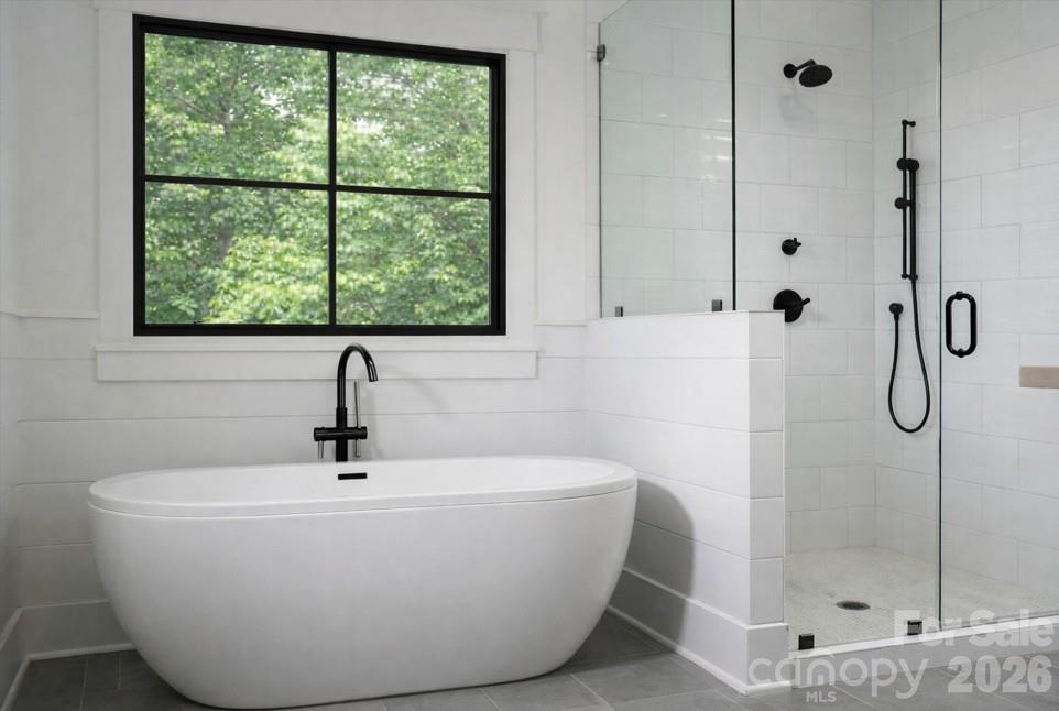 9729 B Flowes Store Road, Unit 2 Midland, NC 28107 - Photo 15 of 22 a white bath tub sitting next to a shower