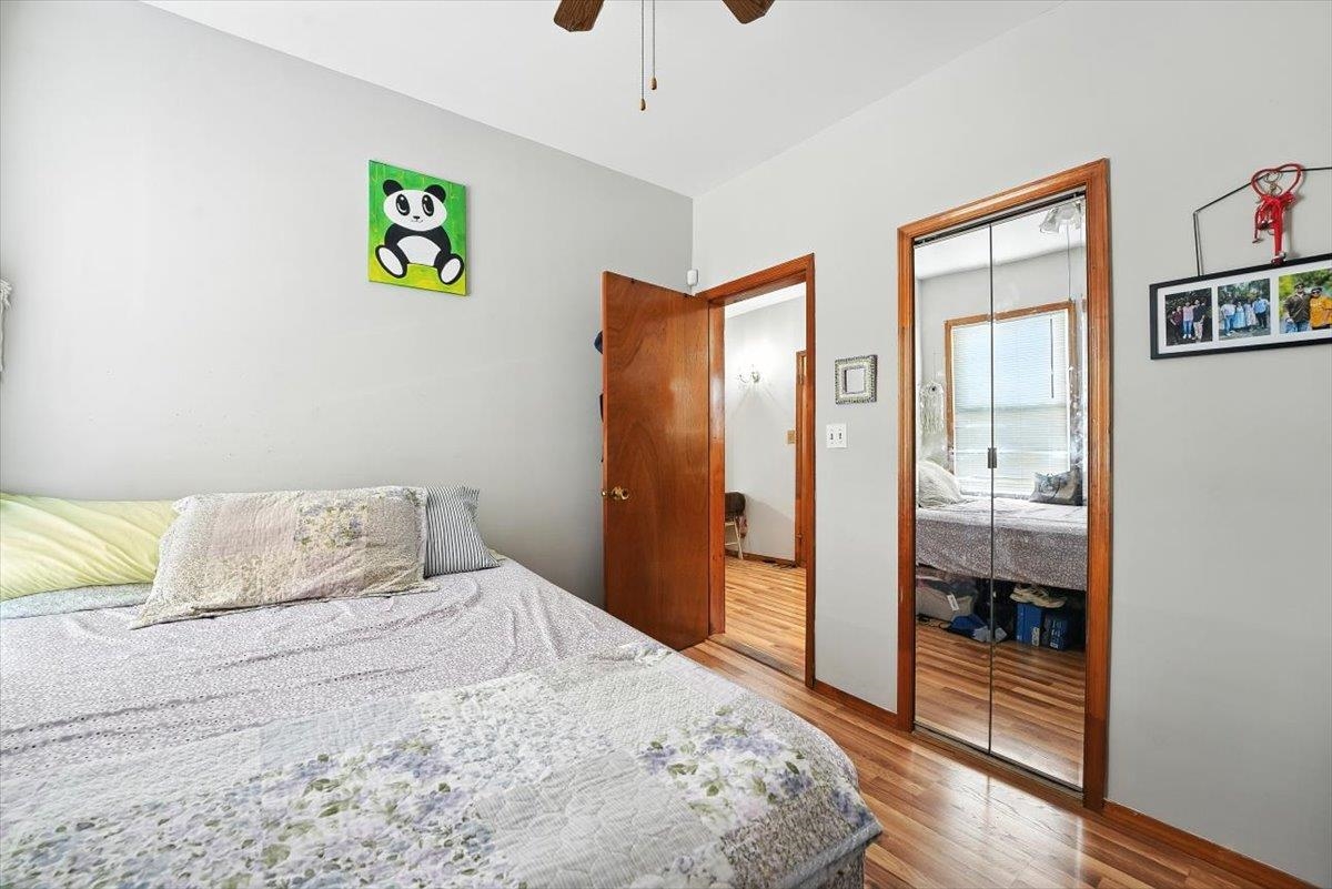 175 Van Winkle Avenue, Unit 1 Jersey City, NJ 07306 - Photo 10 of 14 a bedroom with a bed and a window