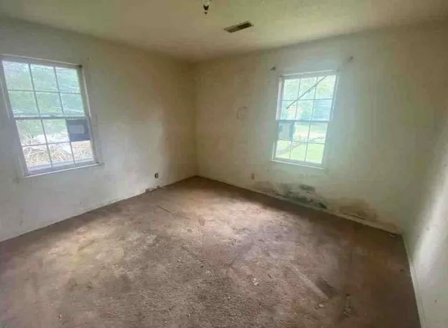 an empty room with a window