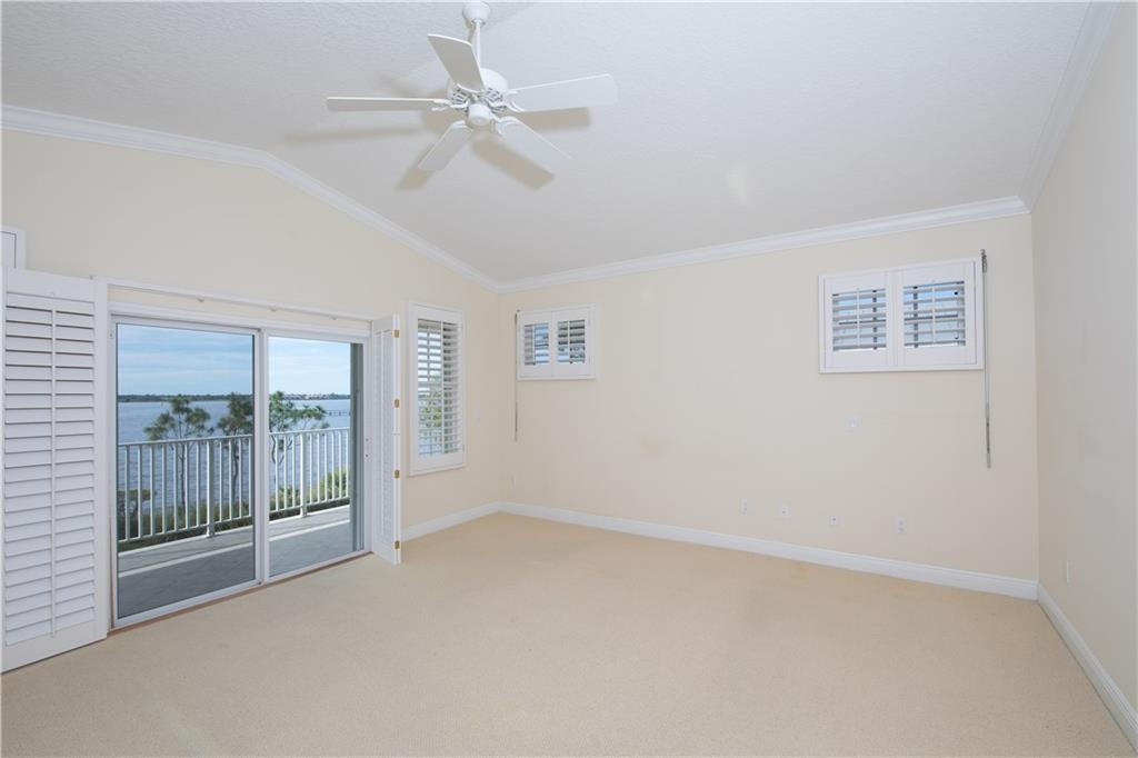 2174 Northwest Plumbago Trail Stuart, FL 34994 - Photo 11 of 26 a view of an empty room with a window
