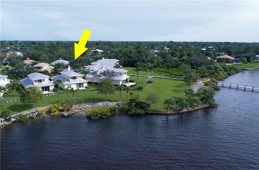 2174 Northwest Plumbago Trail Stuart, FL 34994 - Photo 3 of 26 a view of a lake with a area
