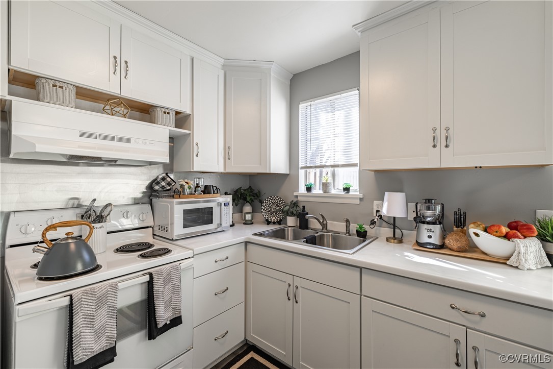 1801 Beaver Road Highland Springs, VA 23075 - Photo 18 of 28 Kitchen featuring sink, white appliances, decorati