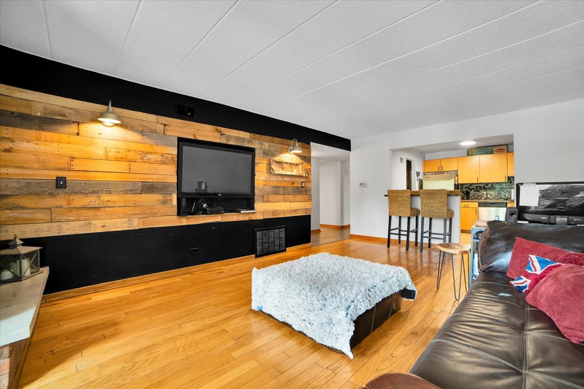 14511 Central Court, Unit M2 Oak Forest, IL 60452 - Photo 7 of 38 a living room with furniture floor to ceiling window and an outdoor view