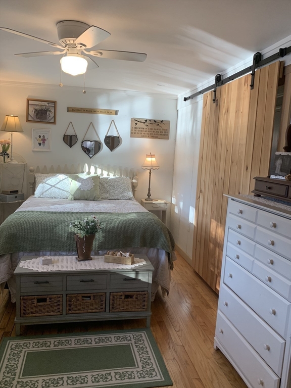 21 Sullivan Road Charlton, MA 01507 - Photo 15 of 35 a bedroom with a bed and a dresser