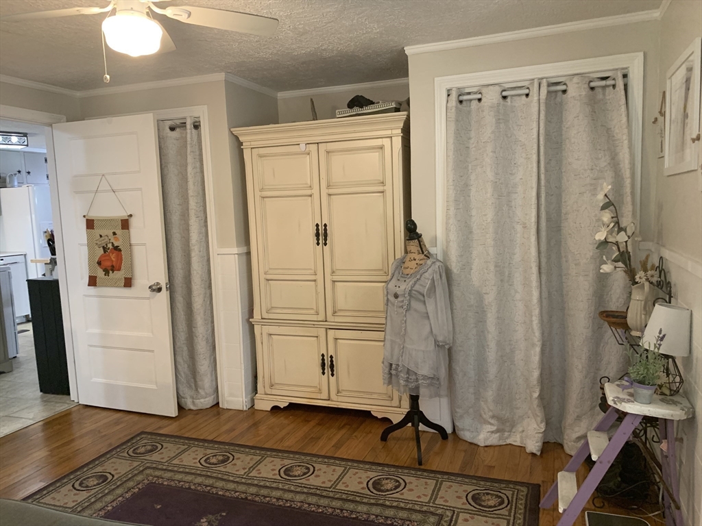 21 Sullivan Road Charlton, MA 01507 - Photo 20 of 35 a view of a closet area with an entryway