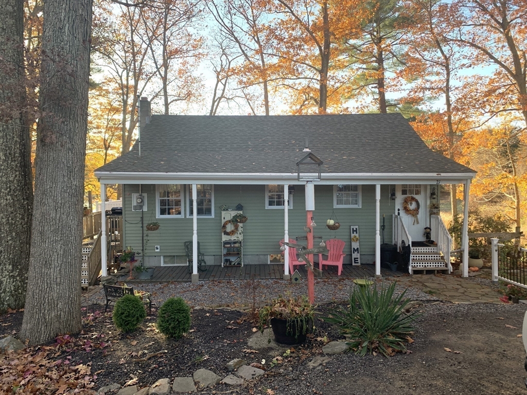 21 Sullivan Road Charlton, MA 01507 - Photo 3 of 35 a view of a house with sitting area and garden
