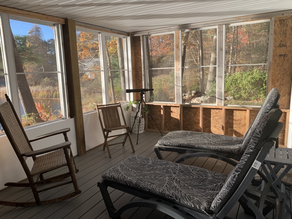 21 Sullivan Road Charlton, MA 01507 - Photo 31 of 35 a living room with furniture and a large window