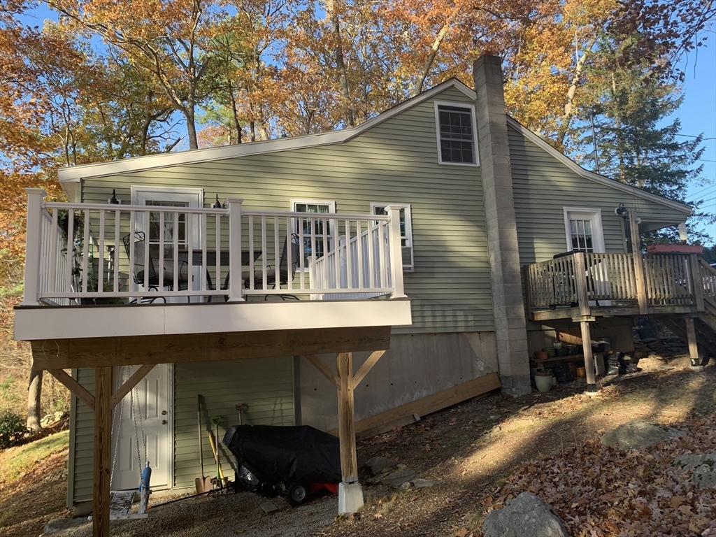 21 Sullivan Road Charlton, MA 01507 - Photo 4 of 35 a front view of a house with a yard