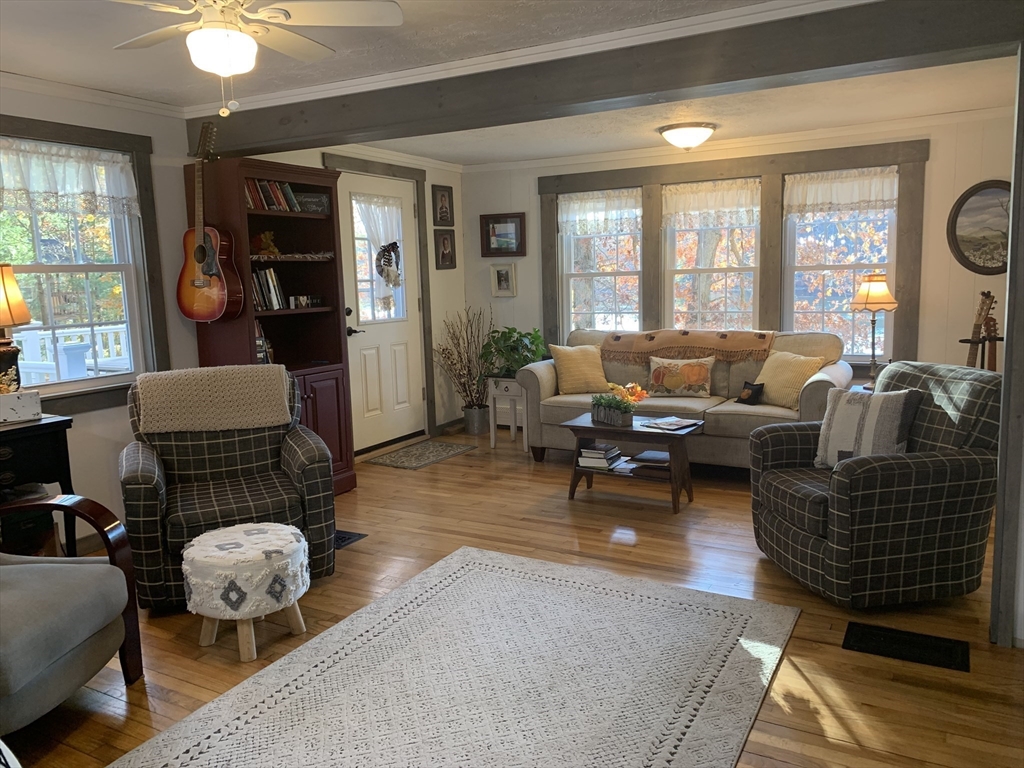 21 Sullivan Road Charlton, MA 01507 - Photo 10 of 35 a living room with furniture and a window