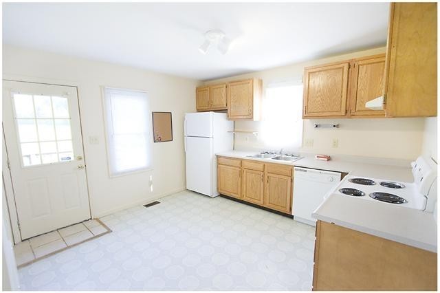 13 Cable Road Oak Grove, KY 42262 - Photo 3 of 7 a kitchen with a refrigerator a stove a microwave and cabinets