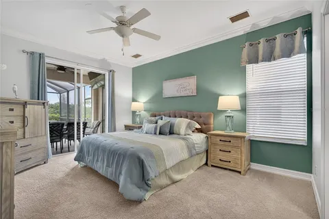 a bedroom with a bed dresser and a window