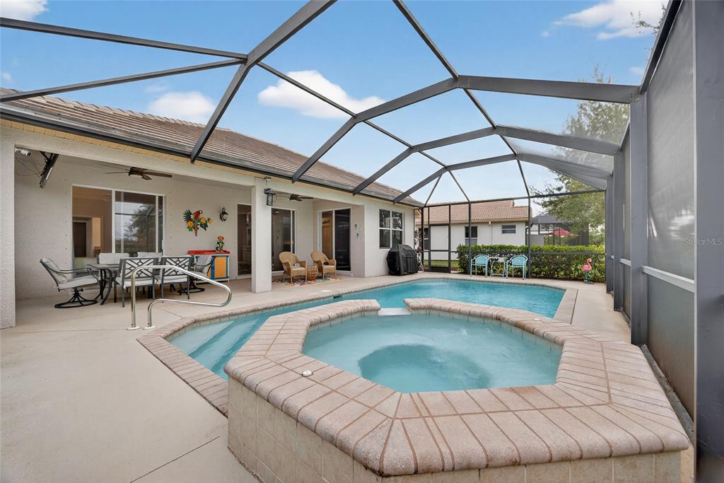 25187 Keygrass Court Punta Gorda, FL 33955 - Photo 3 of 54 a view of swimming pool with outdoor seating