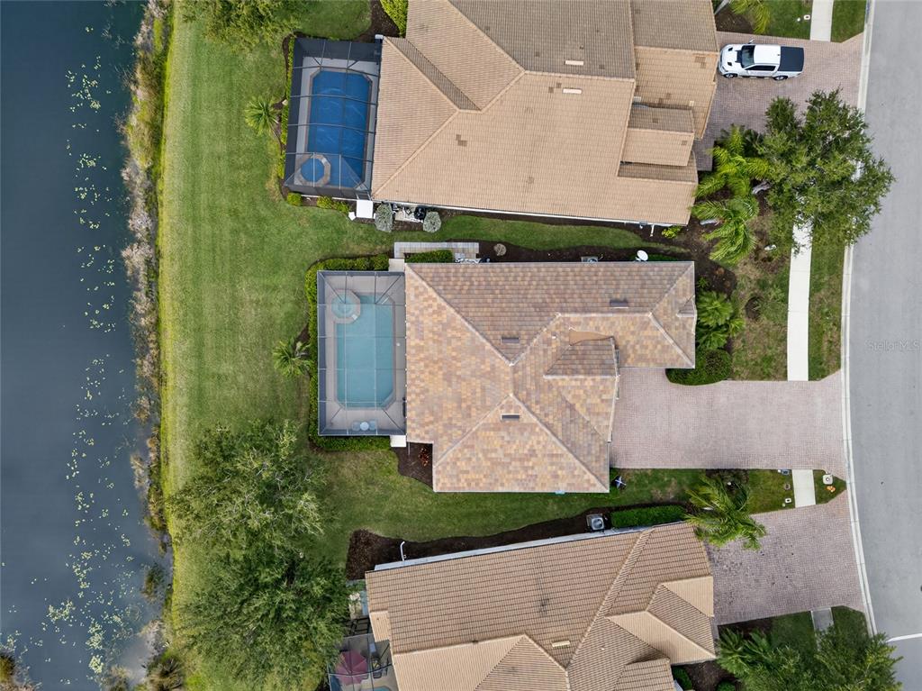 25187 Keygrass Court Punta Gorda, FL 33955 - Photo 35 of 54 an aerial view of a house with a yard basket ball court and outdoor seating
