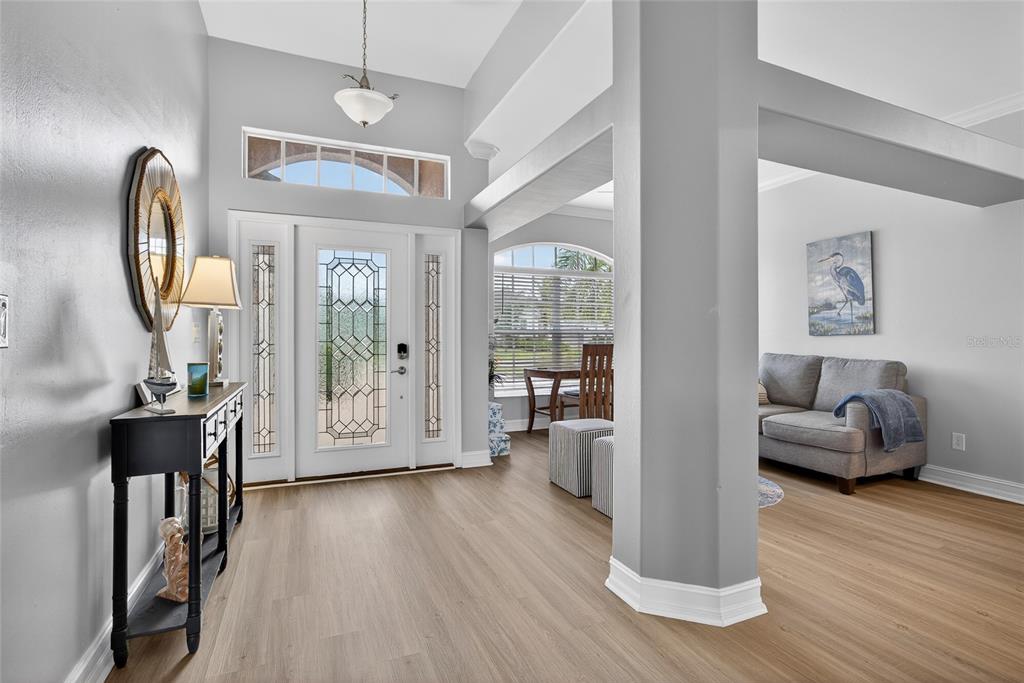 25187 Keygrass Court Punta Gorda, FL 33955 - Photo 5 of 54 a view of livingroom with furniture and wooden floor