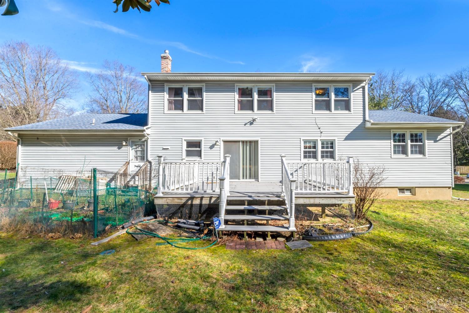 7 Prescott Road East Brunswick, NJ 08816 - Photo 23 of 30 a view of a house with backyard porch and sitting area