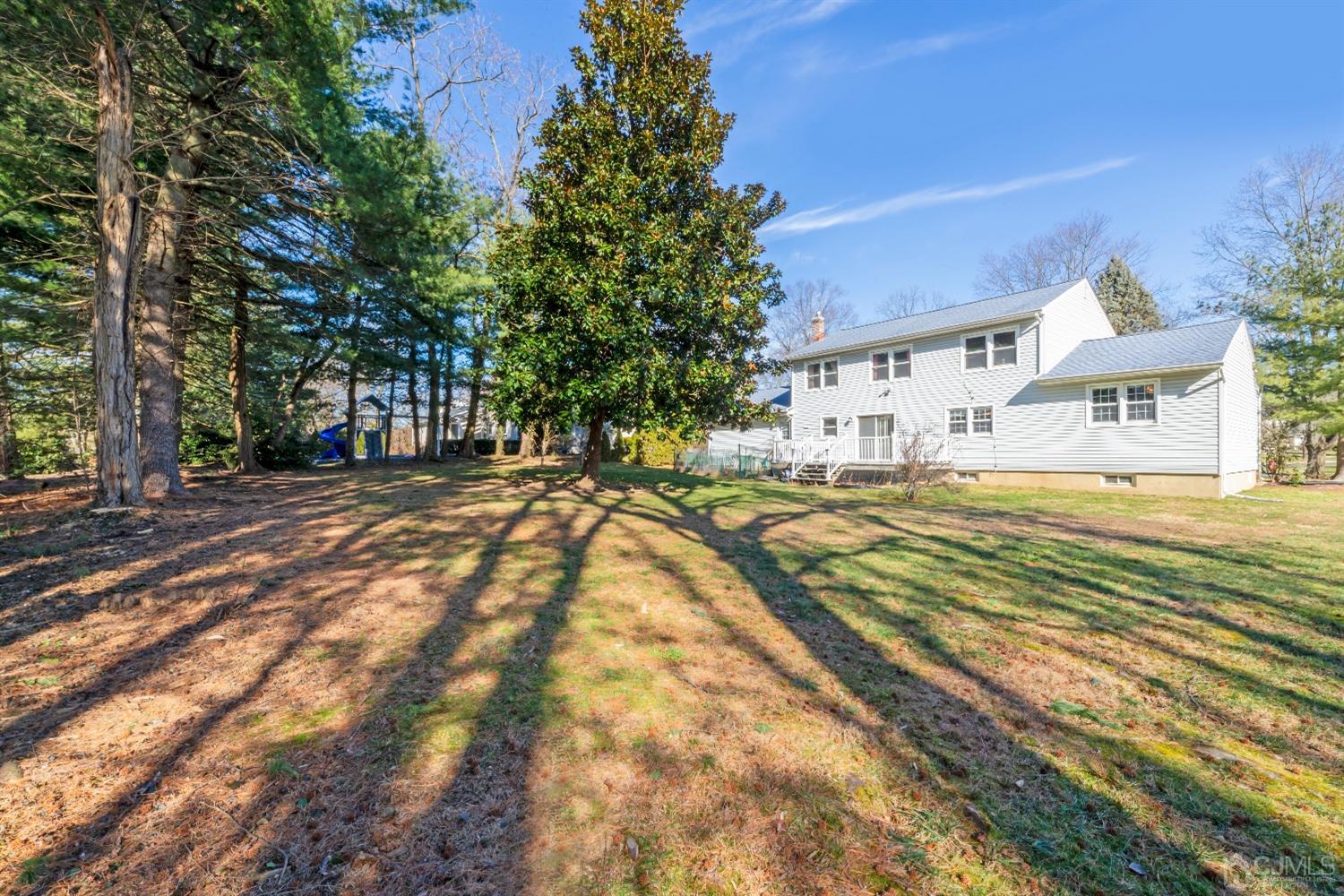 7 Prescott Road East Brunswick, NJ 08816 - Photo 24 of 30 a view of a houses with a yard