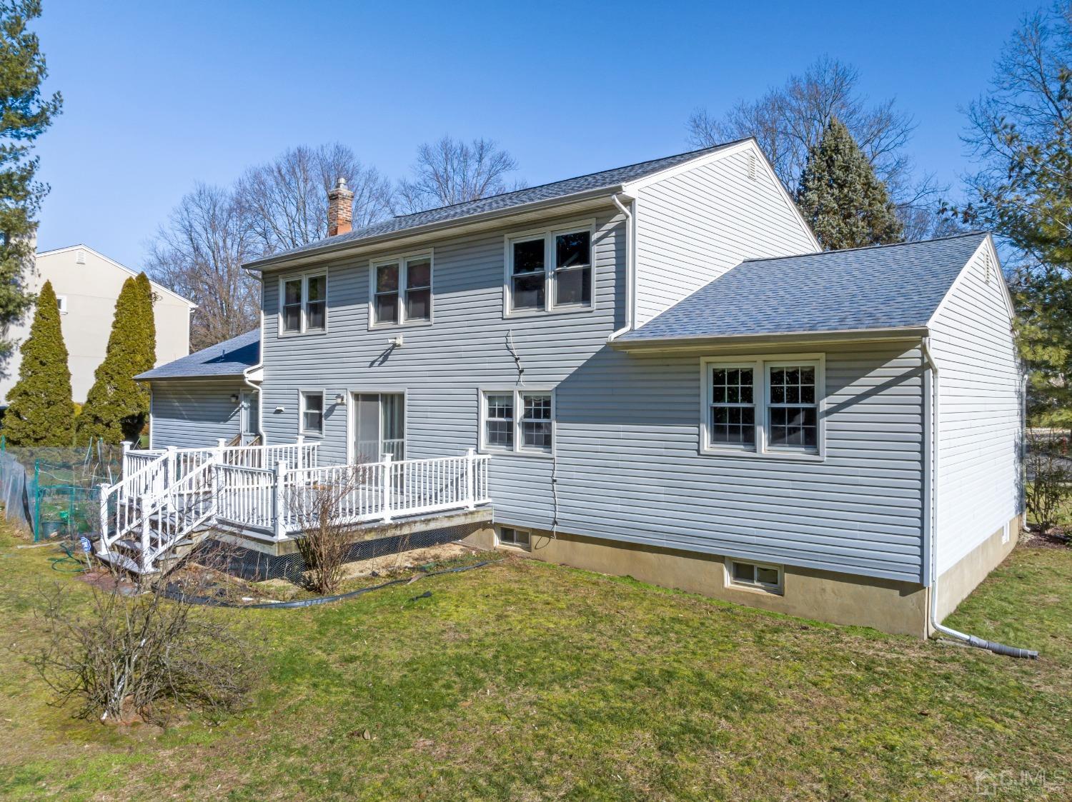 7 Prescott Road East Brunswick, NJ 08816 - Photo 25 of 30 a house view with swimming pool and garden space