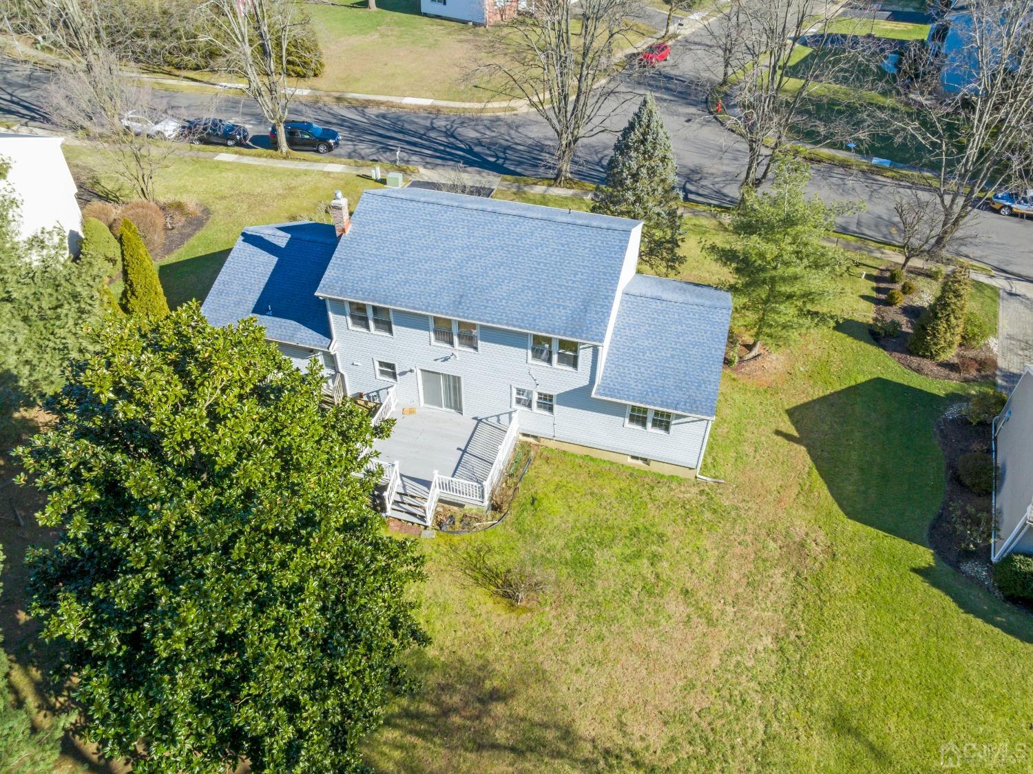 7 Prescott Road East Brunswick, NJ 08816 - Photo 26 of 30 an aerial view of a house with swimming pool